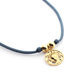 VIRGEN NIÑA DOR - collar medalla dorada 19mm con elástico